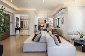 Smart TV, fireplace, video game console, table football