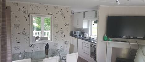 Fridge, oven, cookware/dishes/utensils