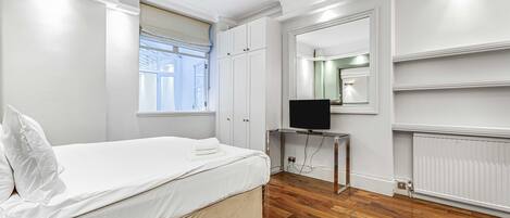 2 dormitorios, tabla de planchar con plancha, wifi y ropa de cama