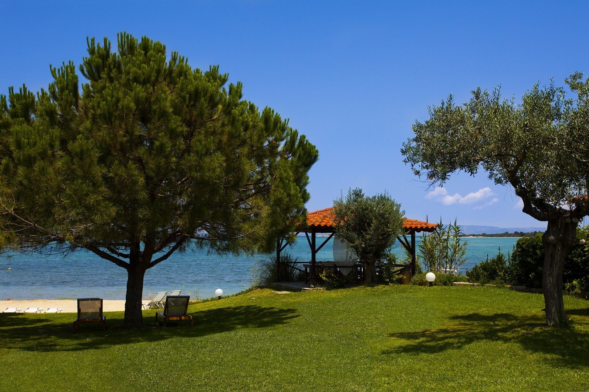 Villa right by the sea, where the wave breaks of pine wooded Vourvourou