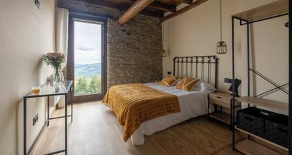 This rural apartment has 65m2, 3 bedrooms and 2 bathrooms, in addition to the kitchen-living room.