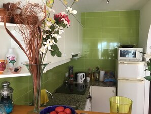 Fridge, microwave, oven, stovetop - Apartment with Pool and Gardens (Arenal d'en Castell)