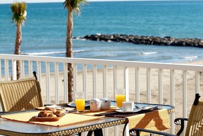 Luxury beachside villa  with private pool, terrace and sea views.