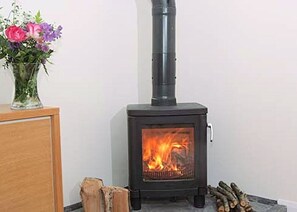 Wood burning stove, keeps it cosy in all seasons.