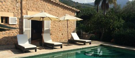 Outdoor pool, sun loungers