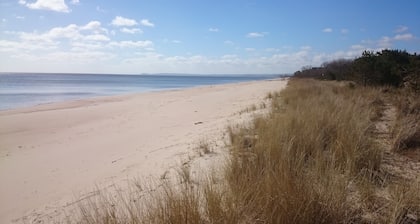 Beach cottage in nature reserve with one minute to the sea and the white sand beach