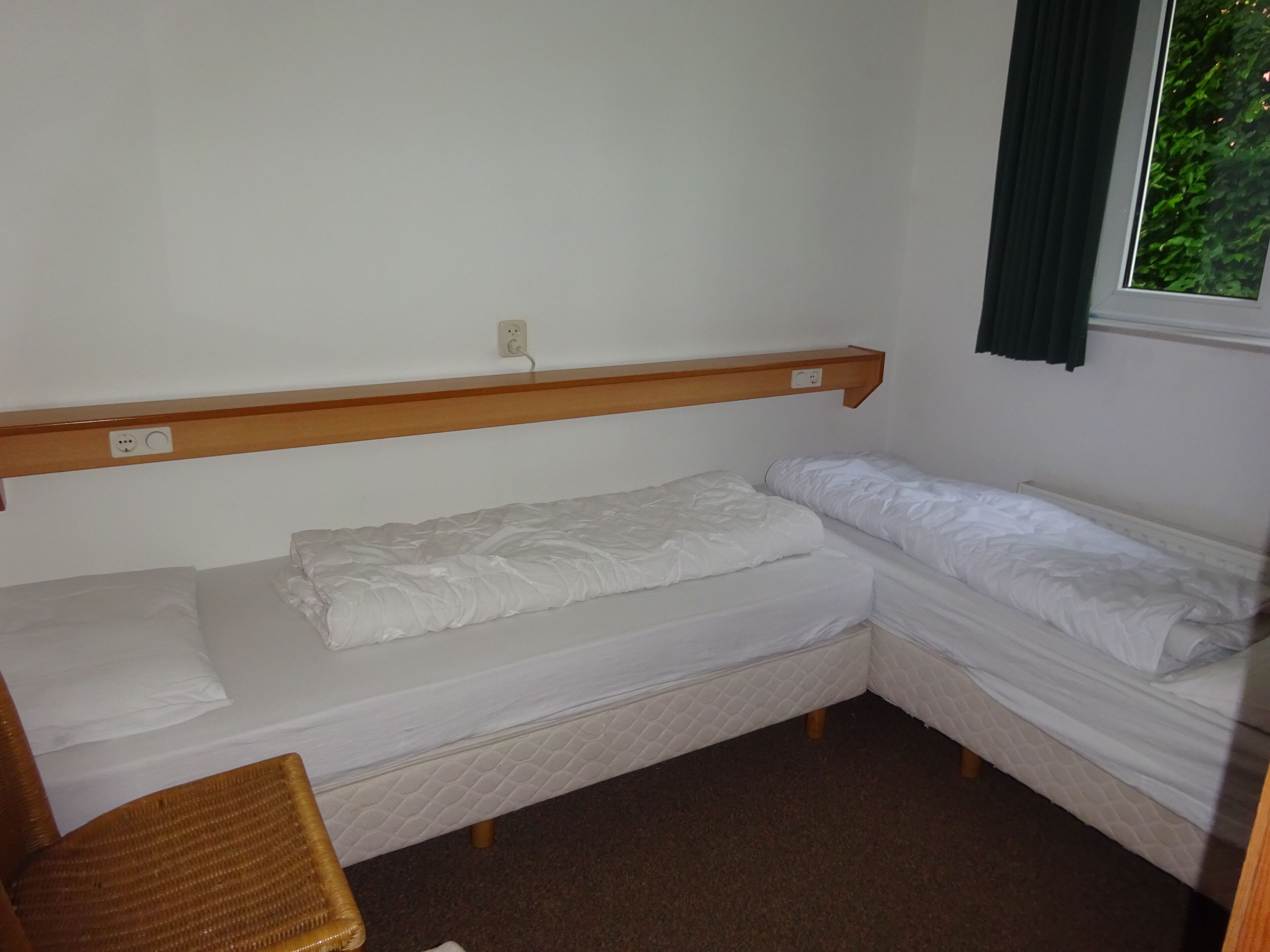 Large house with forest and lake