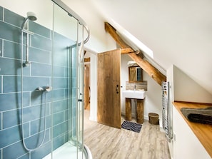 Bathtub, hair dryer, towels, soap
