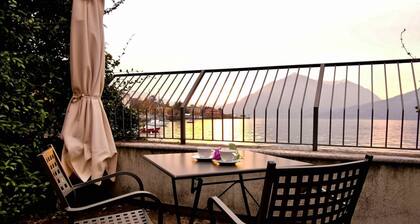 Enjoy the beauty of Lake Como from the comfort of your home! This stunning home boasts a prime location right on the lakeshore, offering breathtaking views of the sparkling lake below. Soak up the serene surroundings and absorb the tranquility of this id