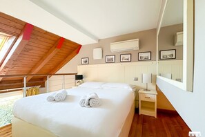 1 dormitorio, sistema de insonorización, tabla de planchar con plancha