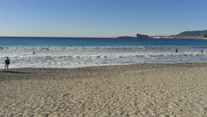 A beach with people surfing and swimming. - House with garden (Saint-Cyr-Sur-Mer)