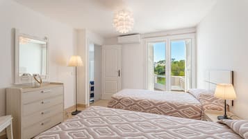 2 dormitorios, tabla de planchar con plancha, cuna de viaje y wifi