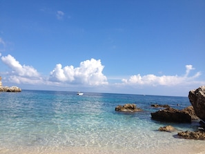 On the beach, sun loungers, beach towels