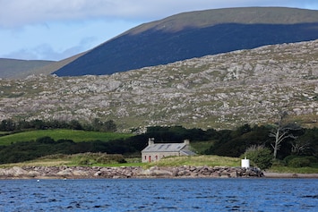 Pier Cottage with mountains behind