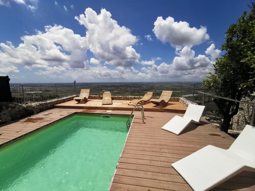 Medieval villa with a pool and a viewpoint overlooking historic walls—between Rome and Naples