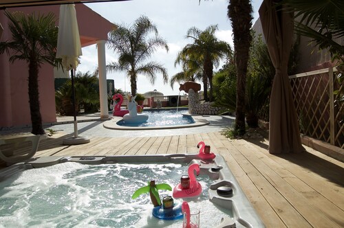 Villa Beach Palace: luxe5 bed villa met verwarmd zwembad, jacuzzi, speelkamerWF 