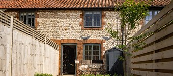 Dolphin Cottage est une belle vieille maison de pêcheur récemment rénovée