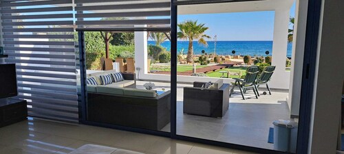 Luxury 5 bedroomed beach-front villa with amazing unobstructed sea views!