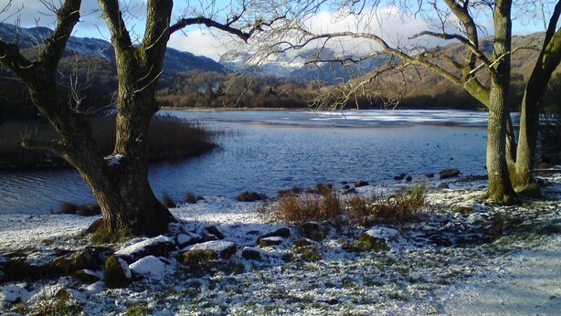 A lake surrounded by trees and mountains. - Lake District Log Cabin (Troutbeck Bridge)
