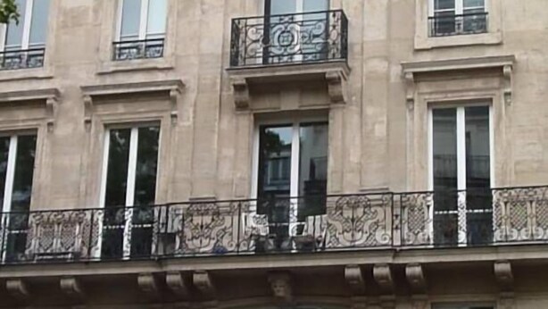 A multi-story building with ornate balconies and large windows. - Studio With a Nice View of Paris - Luxury Building in the Heart of the Marais (Paris)