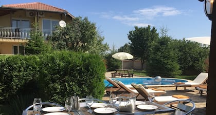 3 bed villa (sleeps 6-8), heated pool, a/c, garden, village location, by sea