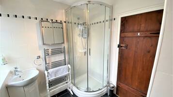 Combined shower/bathtub, hair dryer, soap