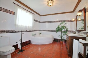 Bathtub, hair dryer, towels