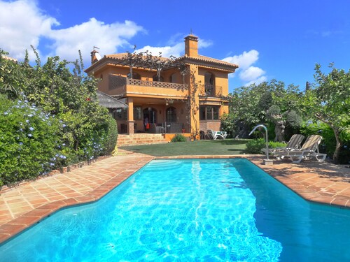 Very spacious family villa with large private heated pool & beautiful sea views