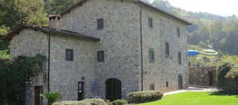 Very large house, surrounded by green, sunny, whit a private pool.