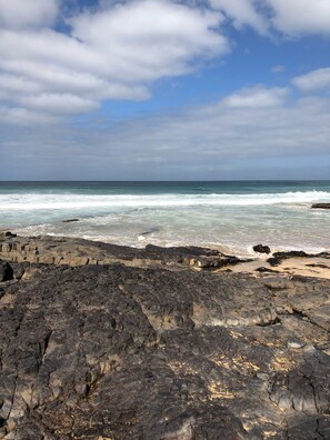 On the beach, beach towels