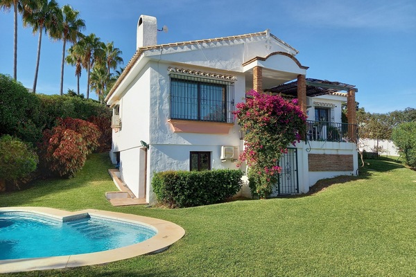 Back of villa, pool and garden