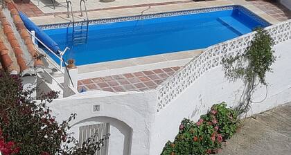 Ranch Studio in Quiet White Village Setting with shared Pool and Hot Tub