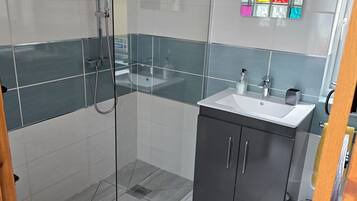 Hair dryer, towels, soap, shampoo