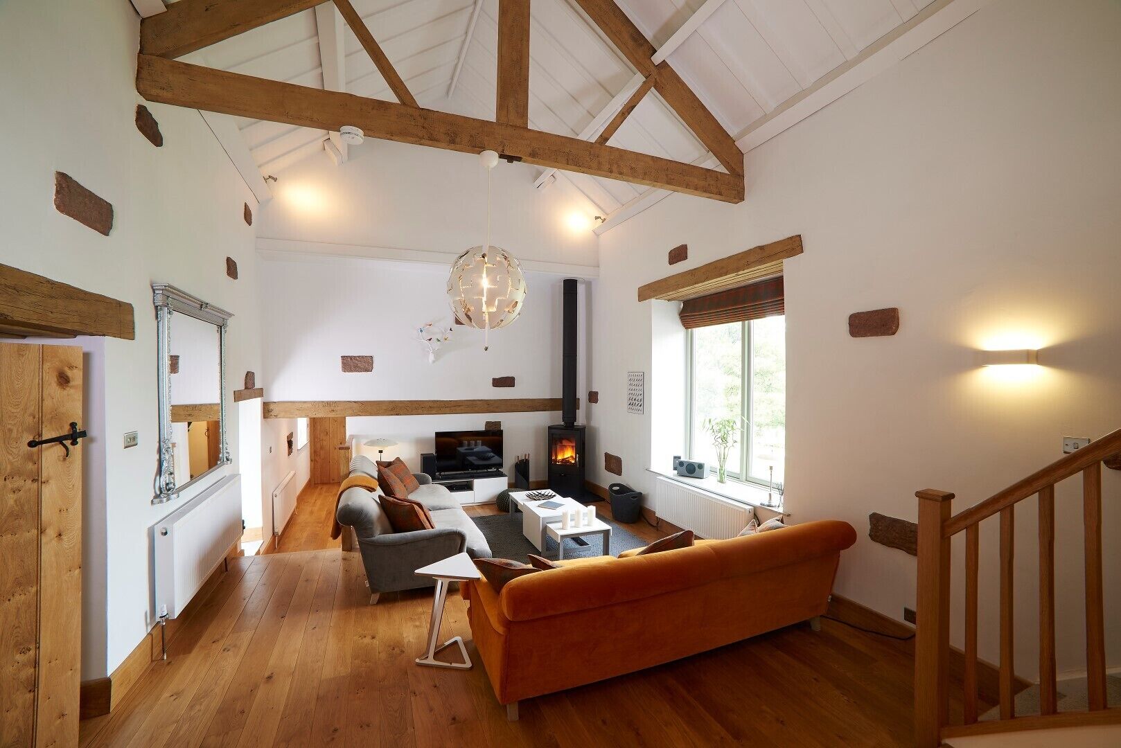 High oak-beamed living room