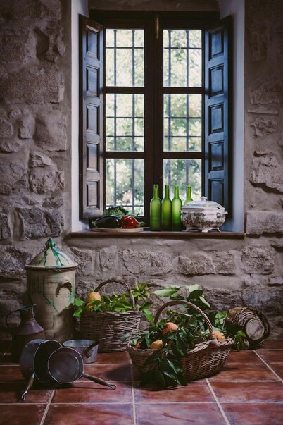 Typical Andalusian farmhouse surrounded by olive and fruit trees