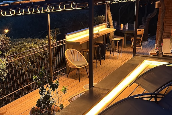 Fully lit terrace area for nighttime entertaining