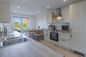 Microwave, dishwasher, high chair - Pebble Cottage, Brancaster Staithe, Norfolk (Brancaster Staithe)