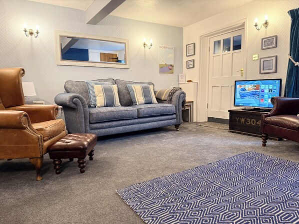 Smart TV, fireplace, DVD player, books
