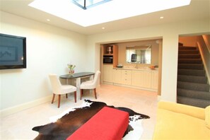 TV, DVD player, books, video library