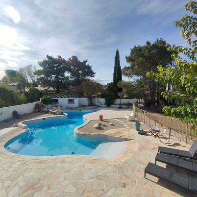 Cottage with private garden in wooded property with swimming pool