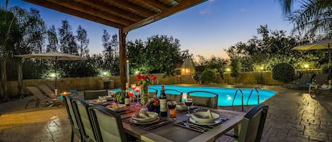 A heated pool, pool loungers