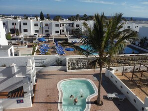 Outdoor pool - Refurbished 2 Bed Apt -  Large Double Balcony with Stunning Sea & Mountain Views (Puerto del Carmen)