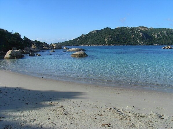 On the beach, sun loungers