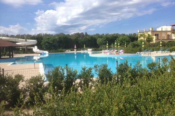 by the pool at 67g Pizzo Beach Club