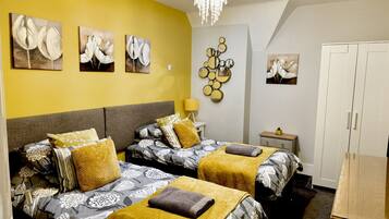 3 bedrooms, desk, iron/ironing board, travel cot