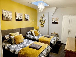 3 bedrooms, desk, iron/ironing board, travel cot