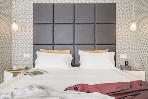 2 عدّة غرف نوم ومكواة/لوح كي وواي فاي وملاءات أسرّة