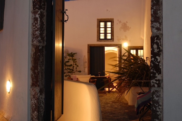 Lit up courtyard in evening