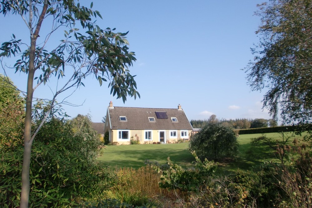 Large house on a working farm