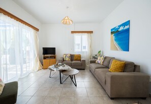 Televisio, DVD-soitin, kirjoja